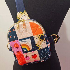 Mav Sling Patchwork Mini Sling Backpack: Ruby Star Society Crossbody Bag